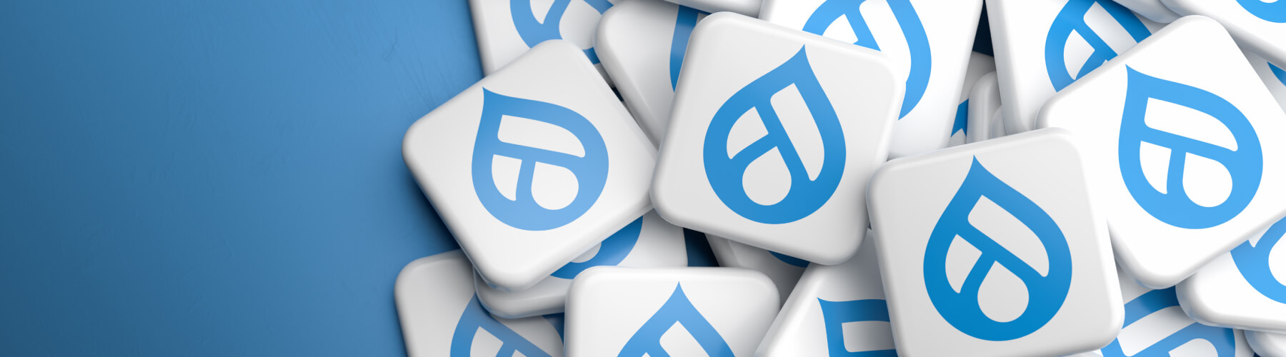 Blue Drupal logo icons stacked on a blue background.