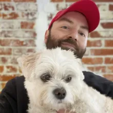 dan chadwick headshot, and carl his dog