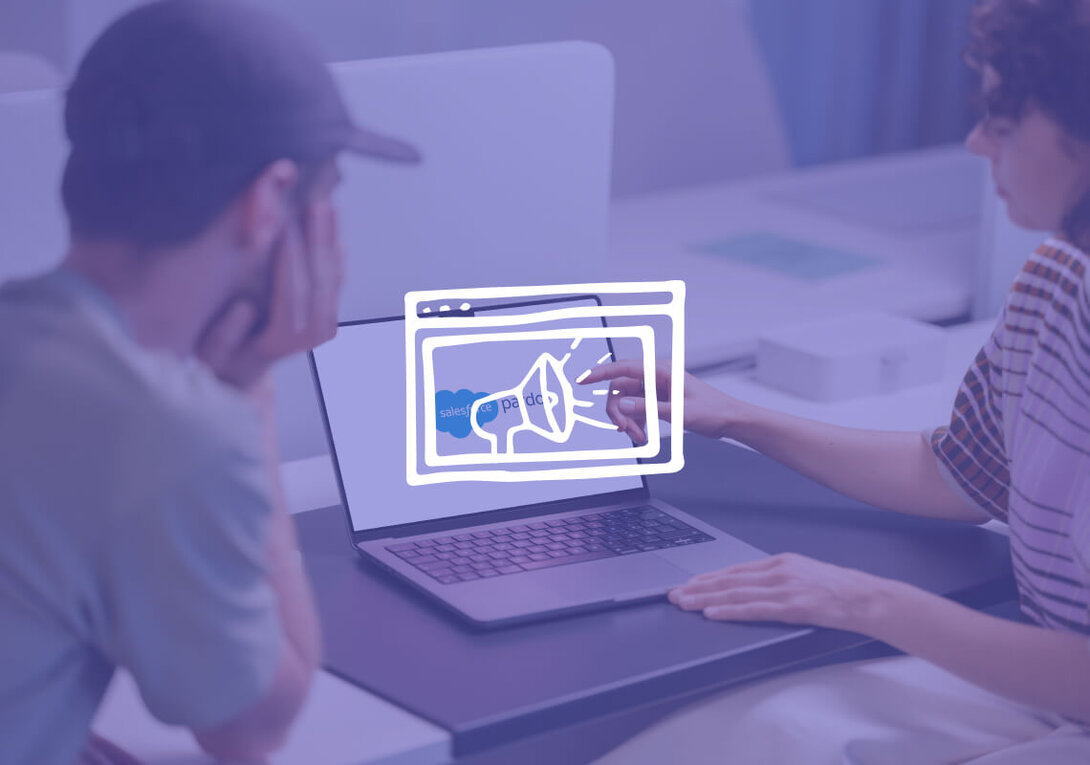 People discussing digital marketing strategy on a laptop.