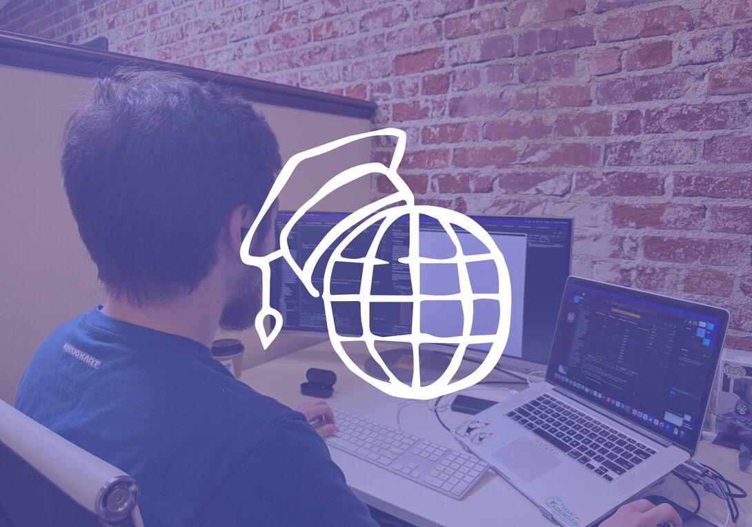 Person working on computer coding, with a superimposed globe and mortarboard icon.