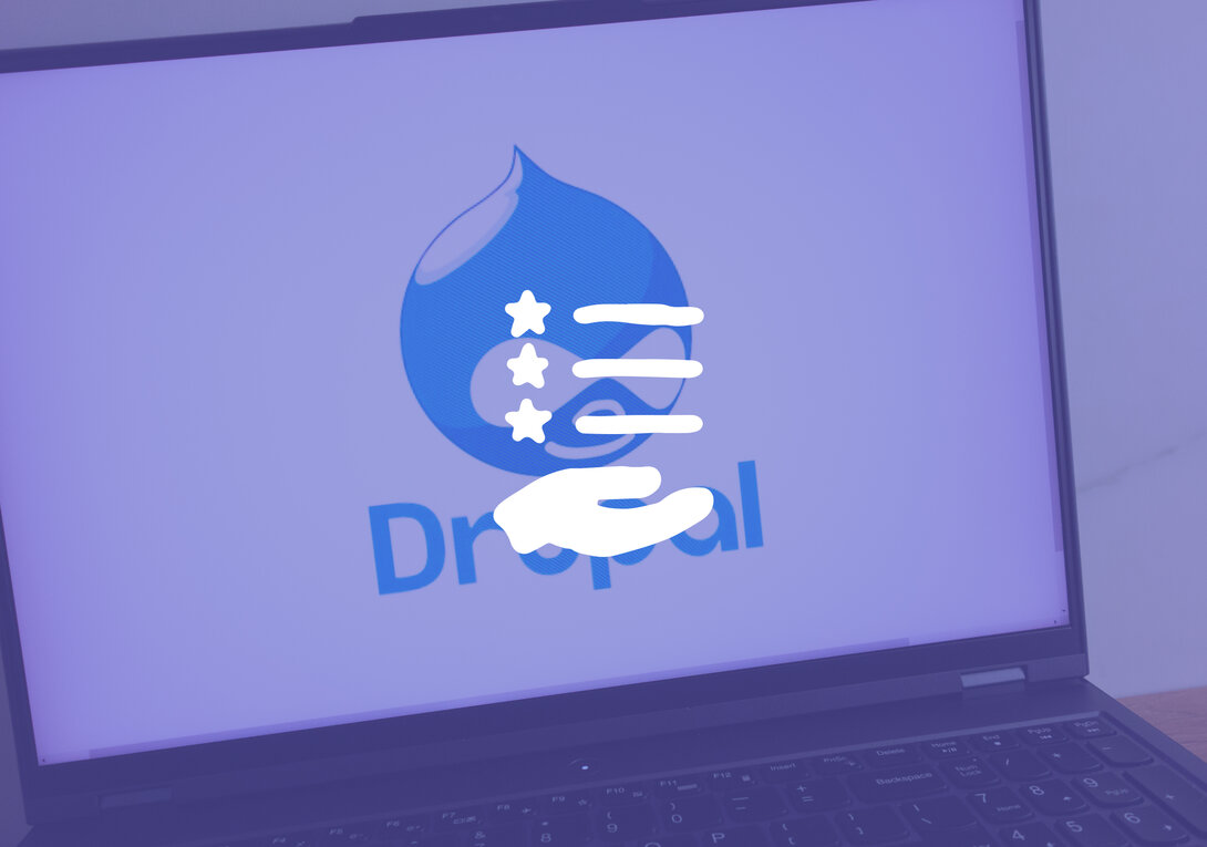 Drupal logo displayed on a laptop screen, symbolizing web development.
