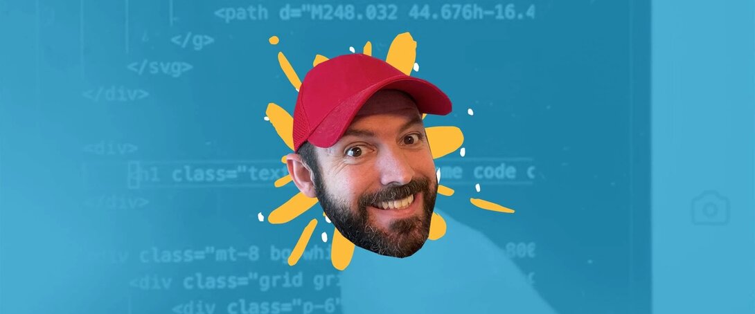 Smiling man in red hat with coding background and colorful splash around.