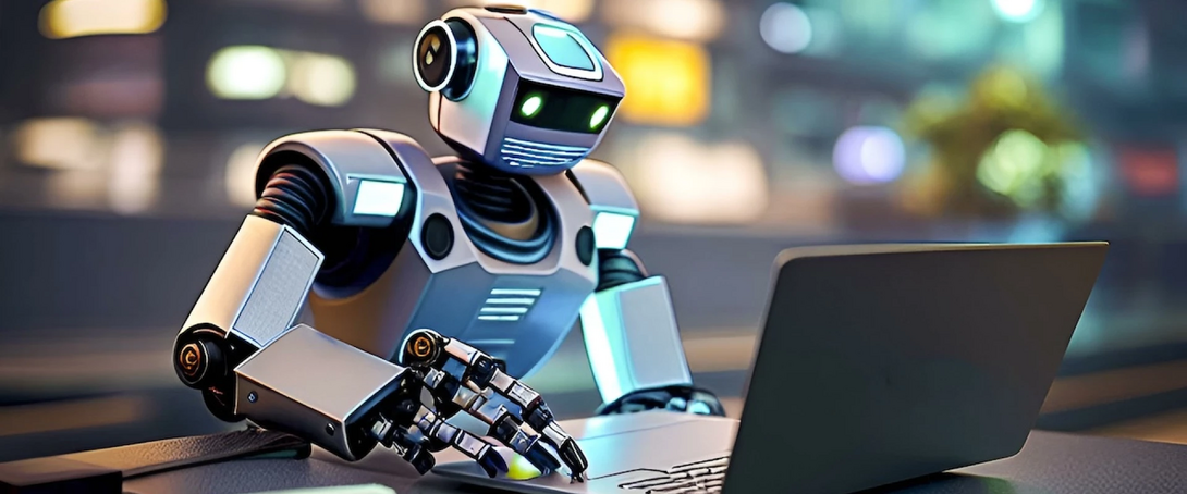 Futuristic robot working on a laptop in a modern office setting.