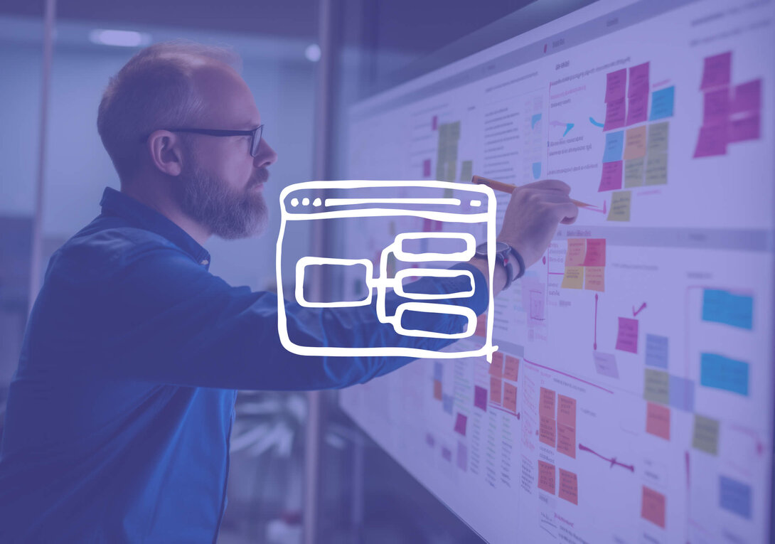 Man planning website structure on a board with browser sketch overlay.