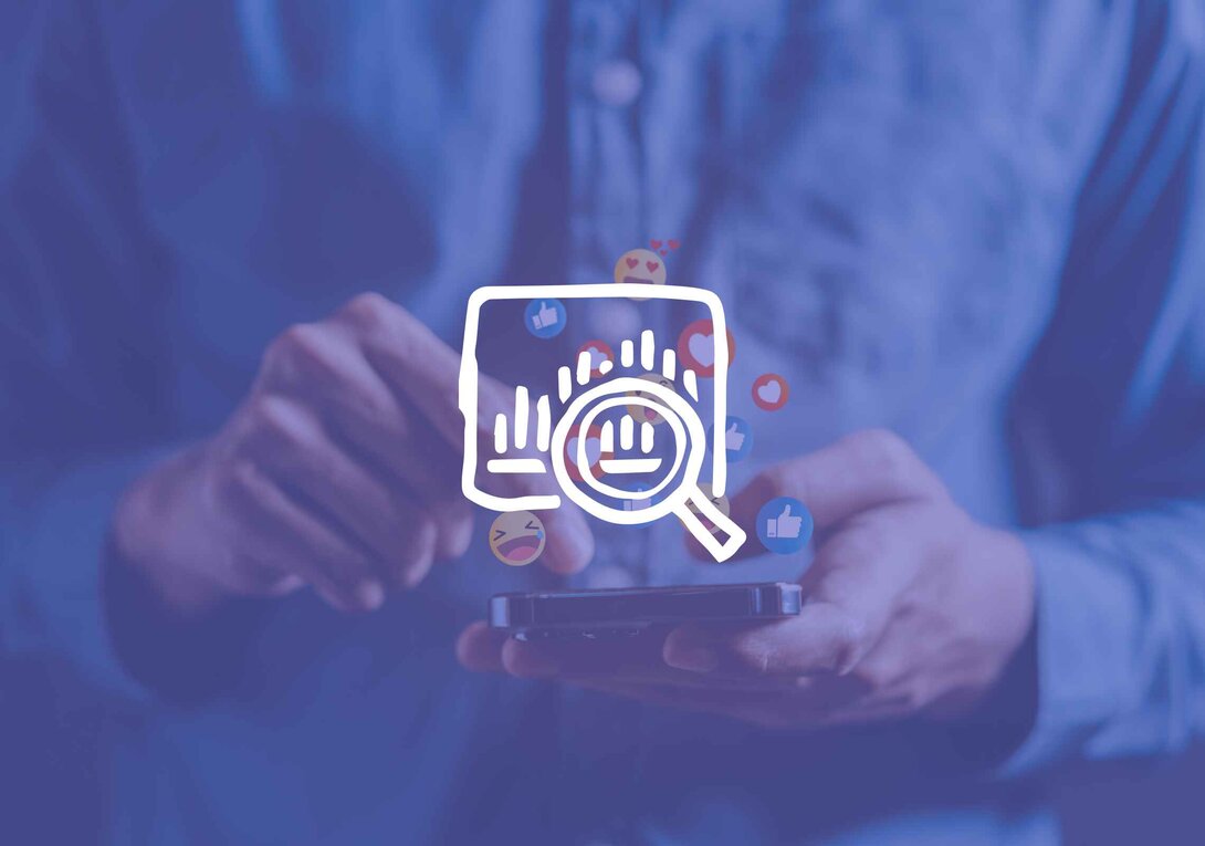 Person using smartphone with social media analytics icons.